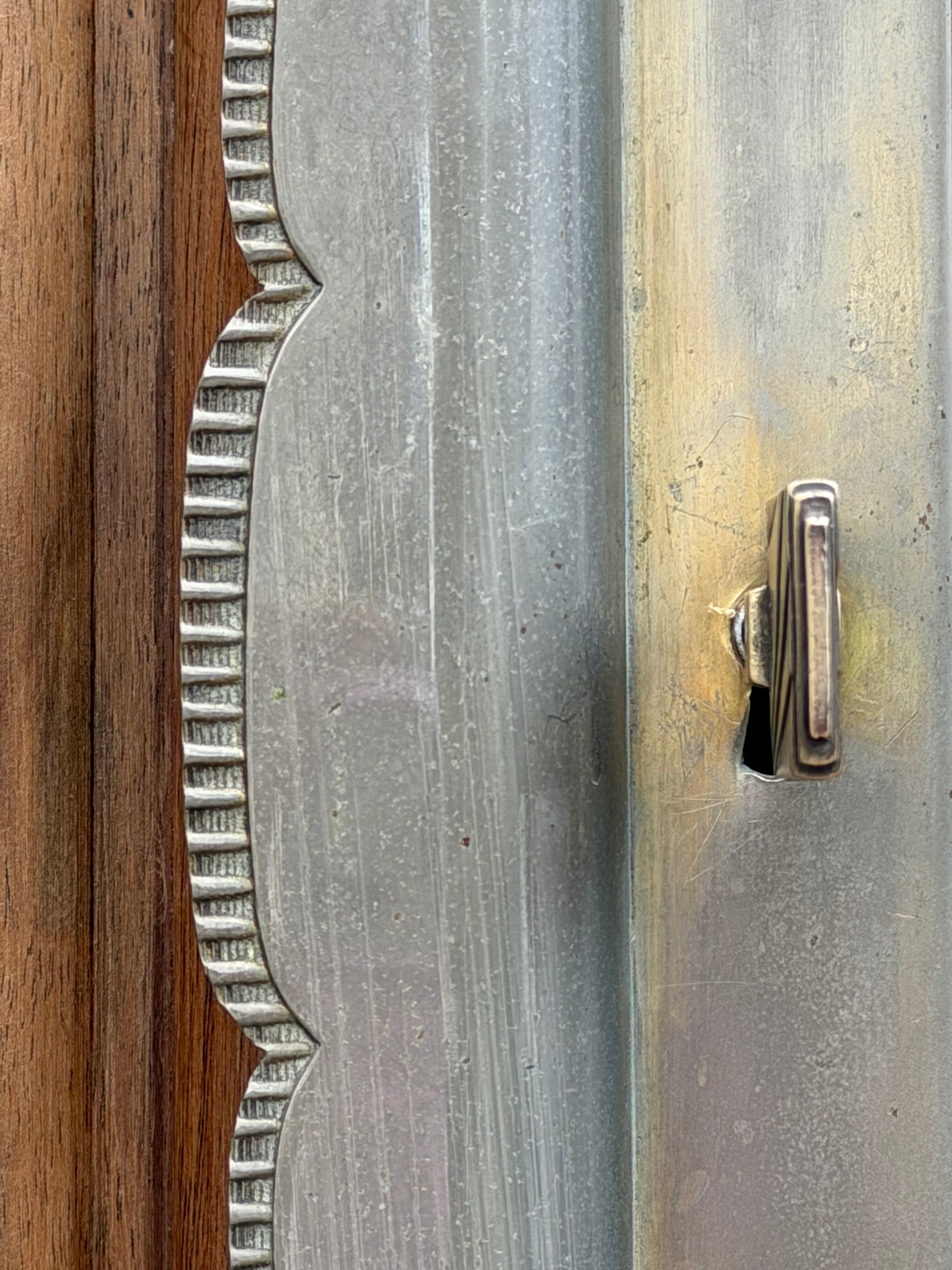 Art Deco wardrobe with bevelled mirror in solid raw walnut.