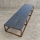 Weighty coffee table with solid iron frame and stone slate table tops, made on commission by architect Alex Vervoordt, Belgium 1990s