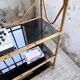 Rattan bookshelf and black glasses