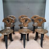 8 consulate-style pressed cardboard chairs