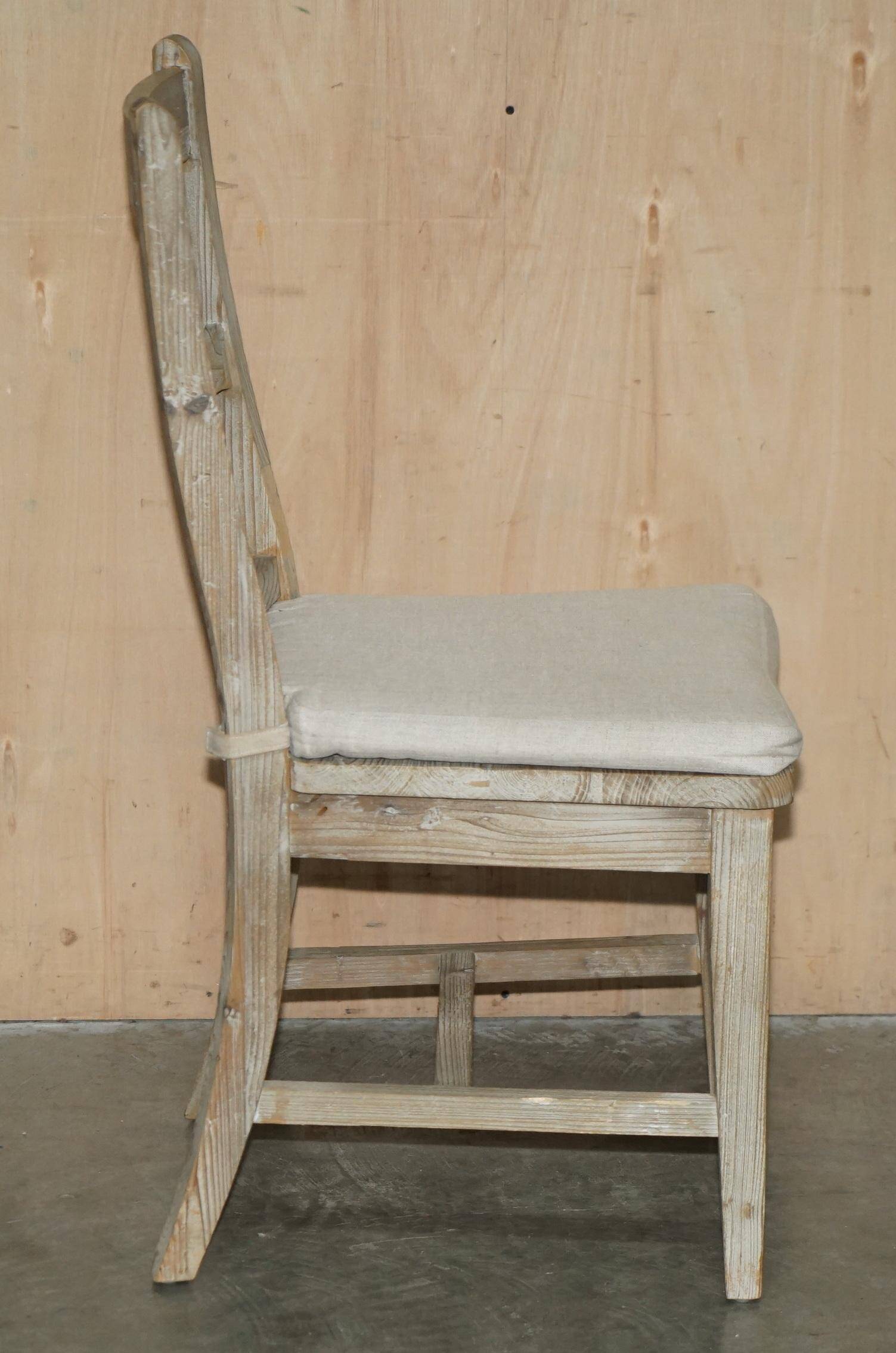 Pair of Swedish-style accent chairs in recycled pine with upholstered seats.