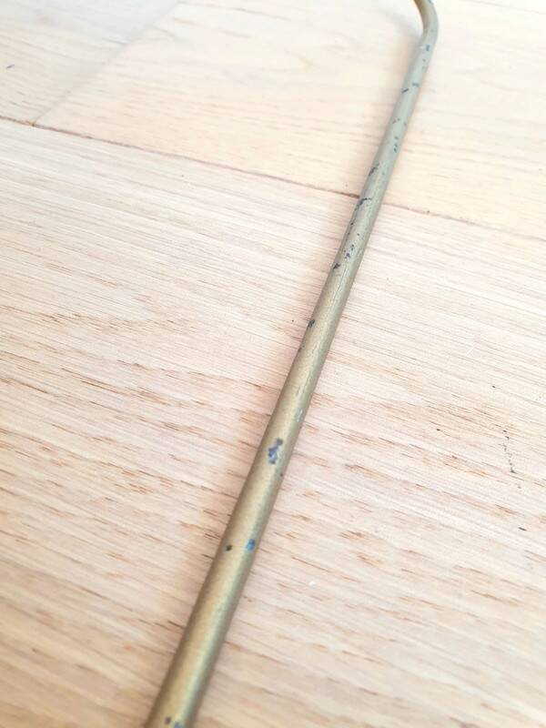 Vintage gold metal magazine rack