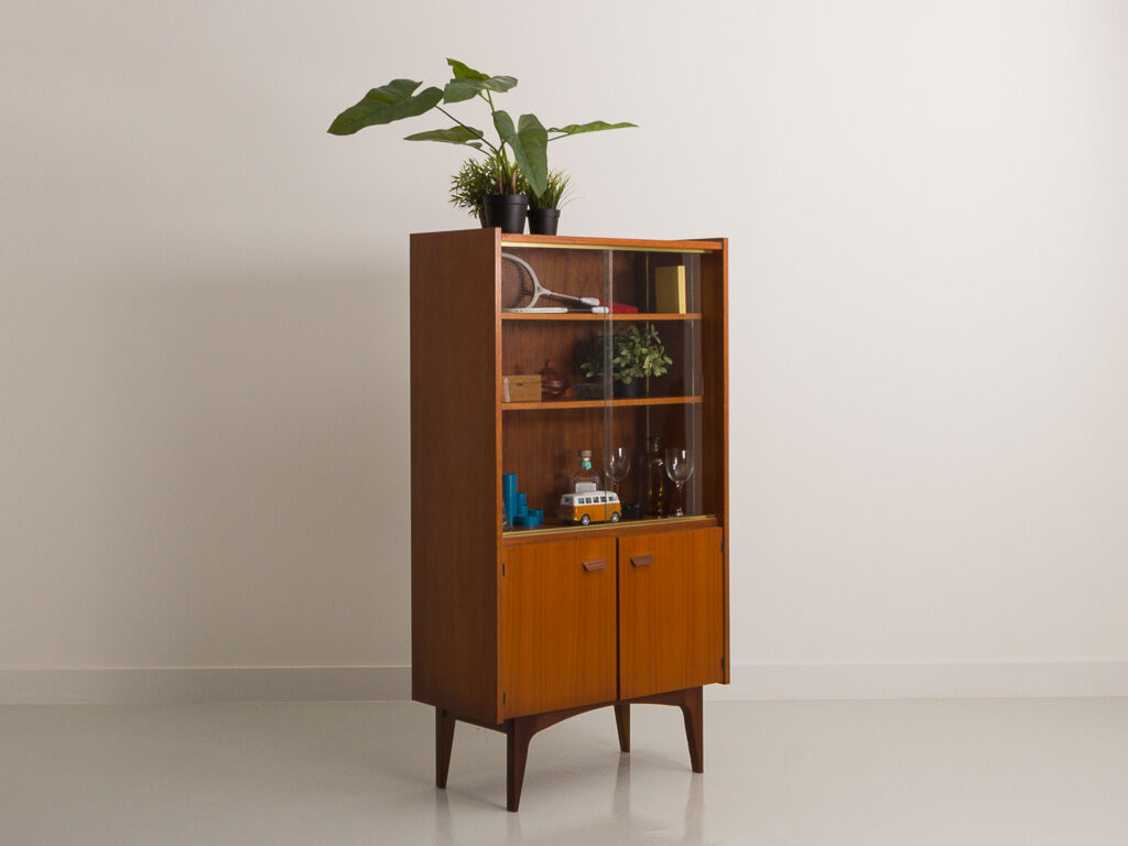 Teak sideboard consisting of a showcase with shelves and a double door