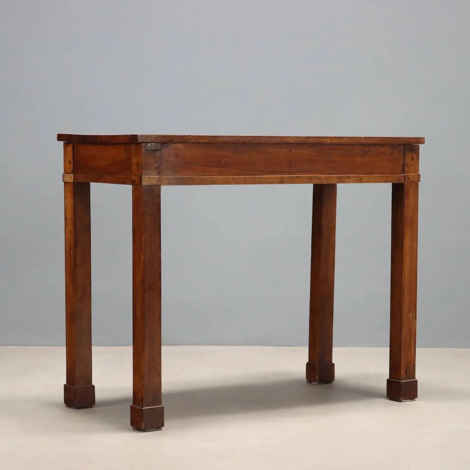 Ancient walnut console empire with drawer, Italy, 19th century.