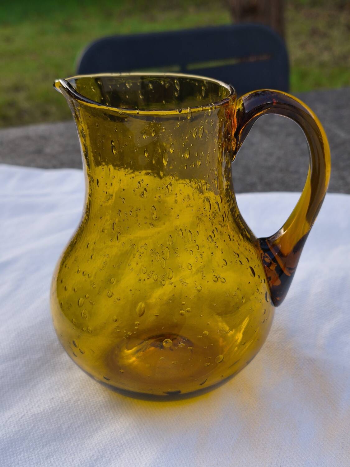 Hand-blown glass pitcher