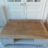 Coffee table on casters, made from an old desk, pearl gray base and belt.