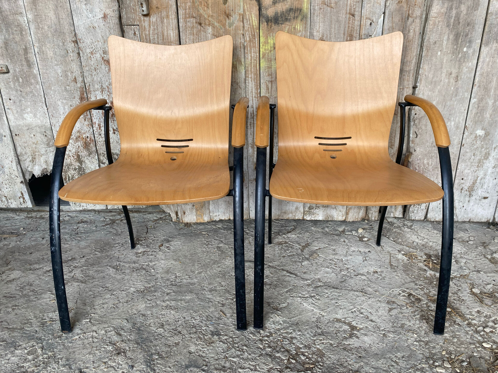 Pair of Vintage RONÉO Armchairs with Black Metal Legs + Curved Wooden Shell