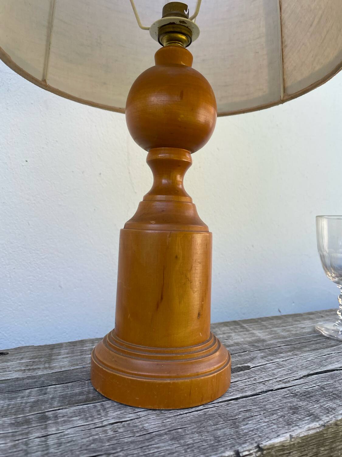 Old turned wooden lamp