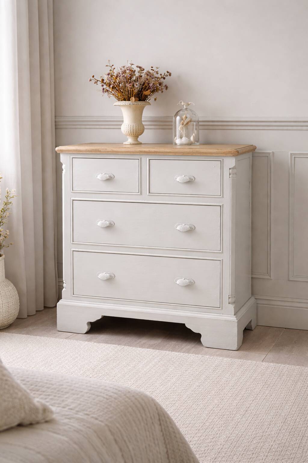 English commode of beautiful craftsmanship enhanced in pearl grey.