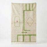 Moroccan rug in Azilal green tone.