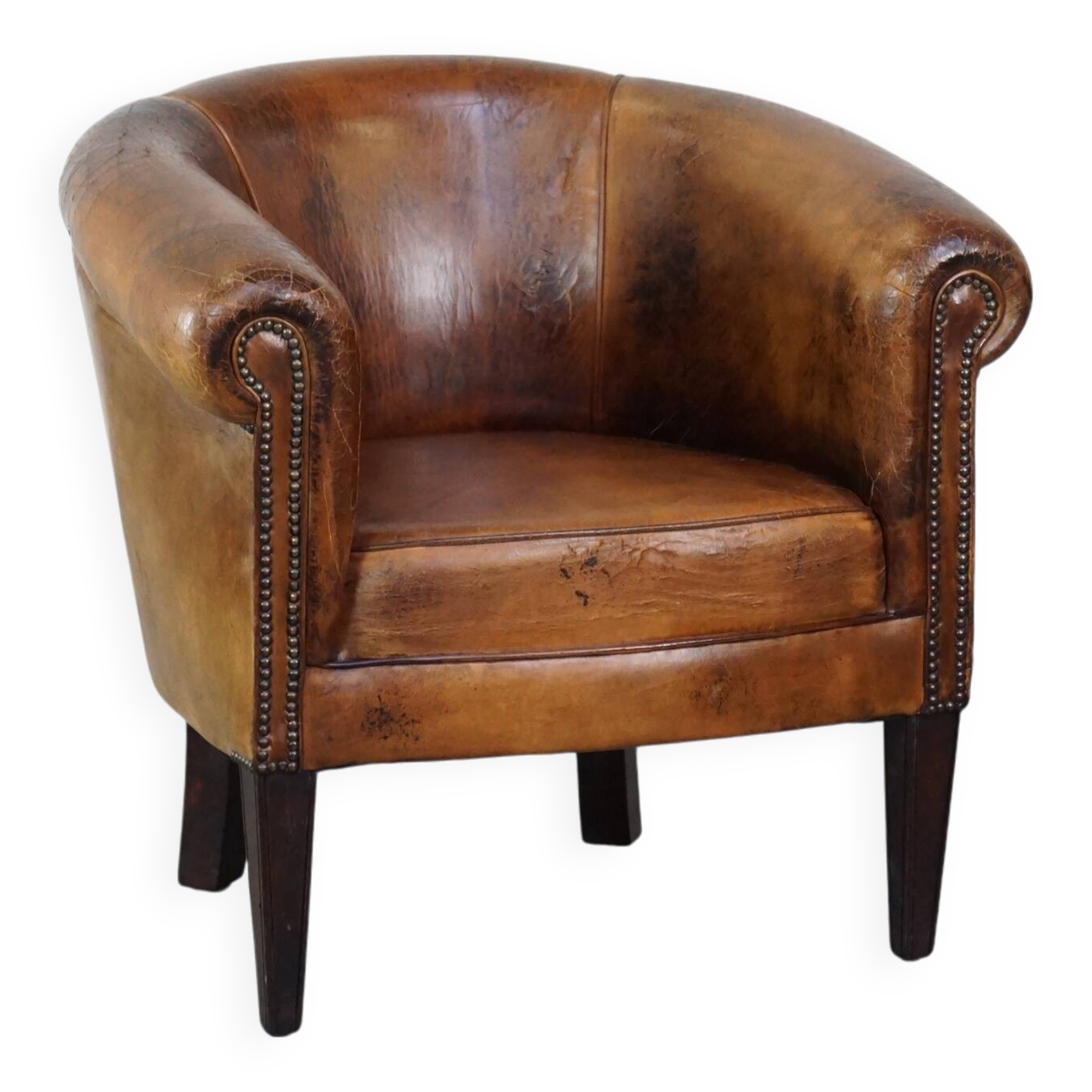 Sturdy, stately and subtle vintage sheepskin club chair