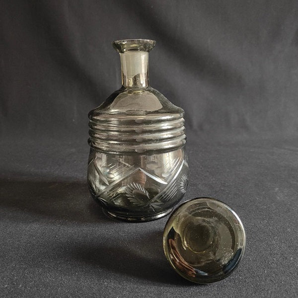 Engraved smoked glass decanter
