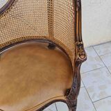 Fauteuil de bureau louis xv, sculpté, canné, garni cuir