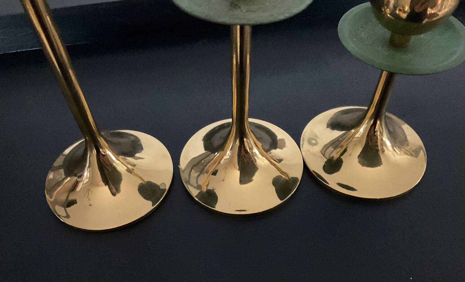 Trio of vintage brass candlesticks