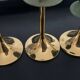 Trio of vintage brass candlesticks