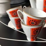 Cafetière orange et 4 tasses et pot à lait motif fleurs