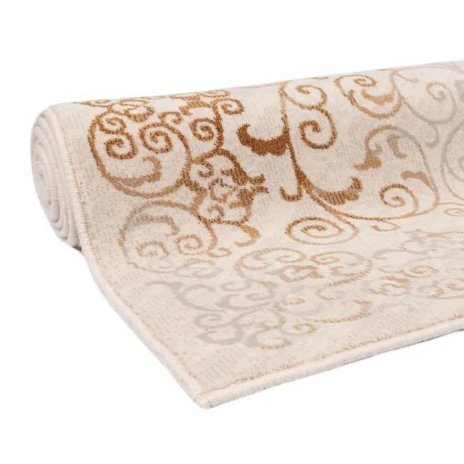 Vintage cream and brown Persian-style carpet in wool.