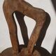 3 brutalist wooden tripod chairs