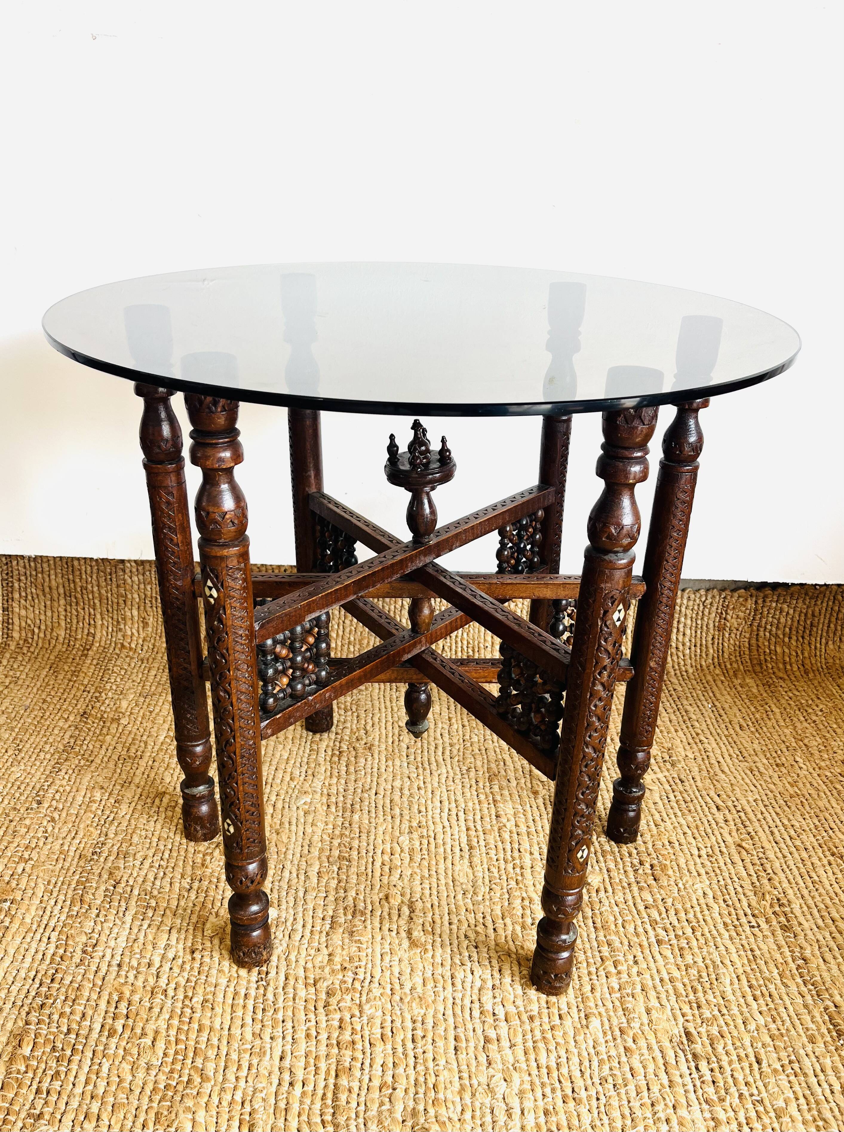 Moroccan hexagonal carved wood side table with glass top