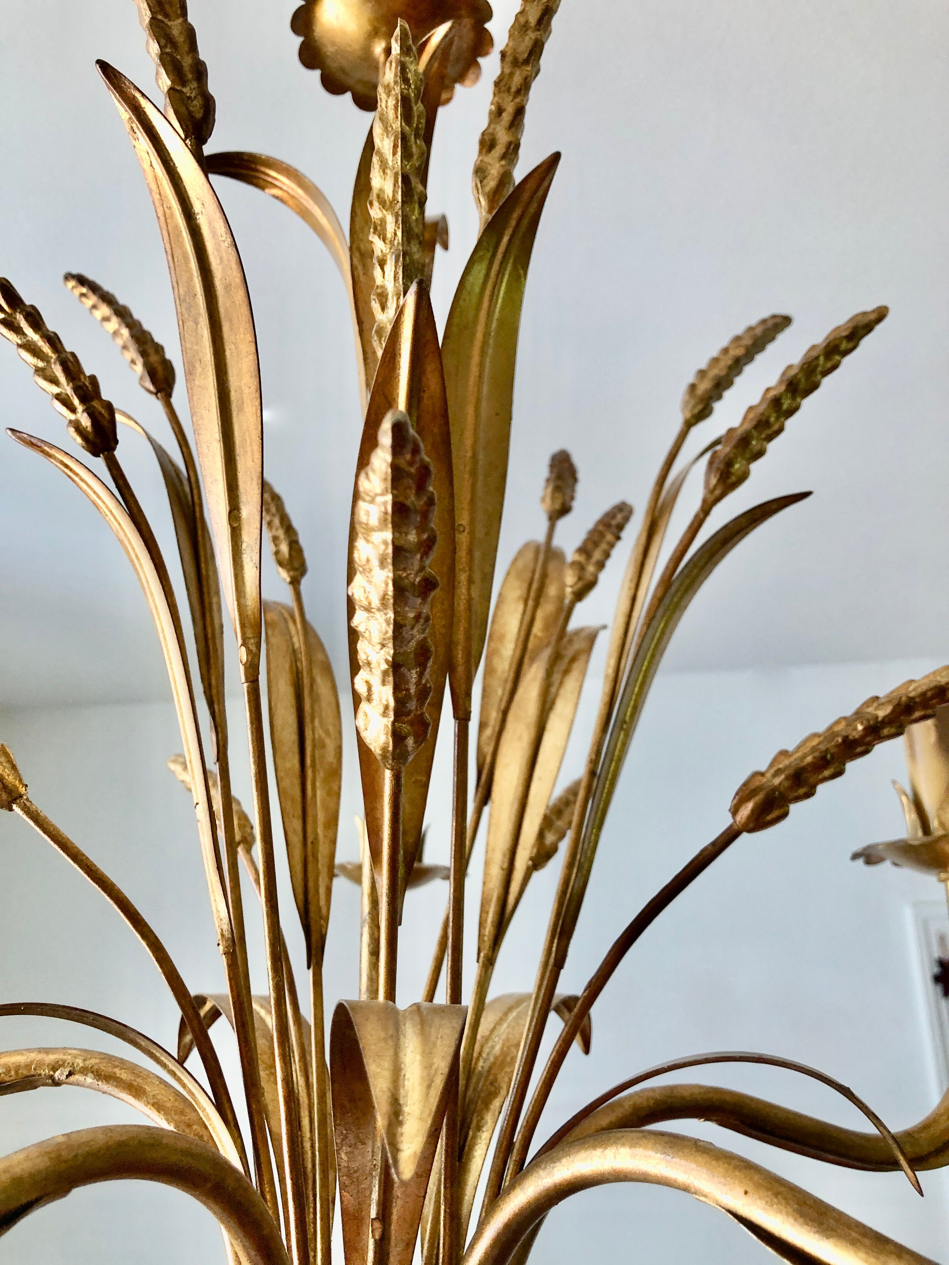 Golden suspension 5 fires with a bouquet of ears of wheat