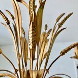 Golden suspension 5 fires with a bouquet of ears of wheat