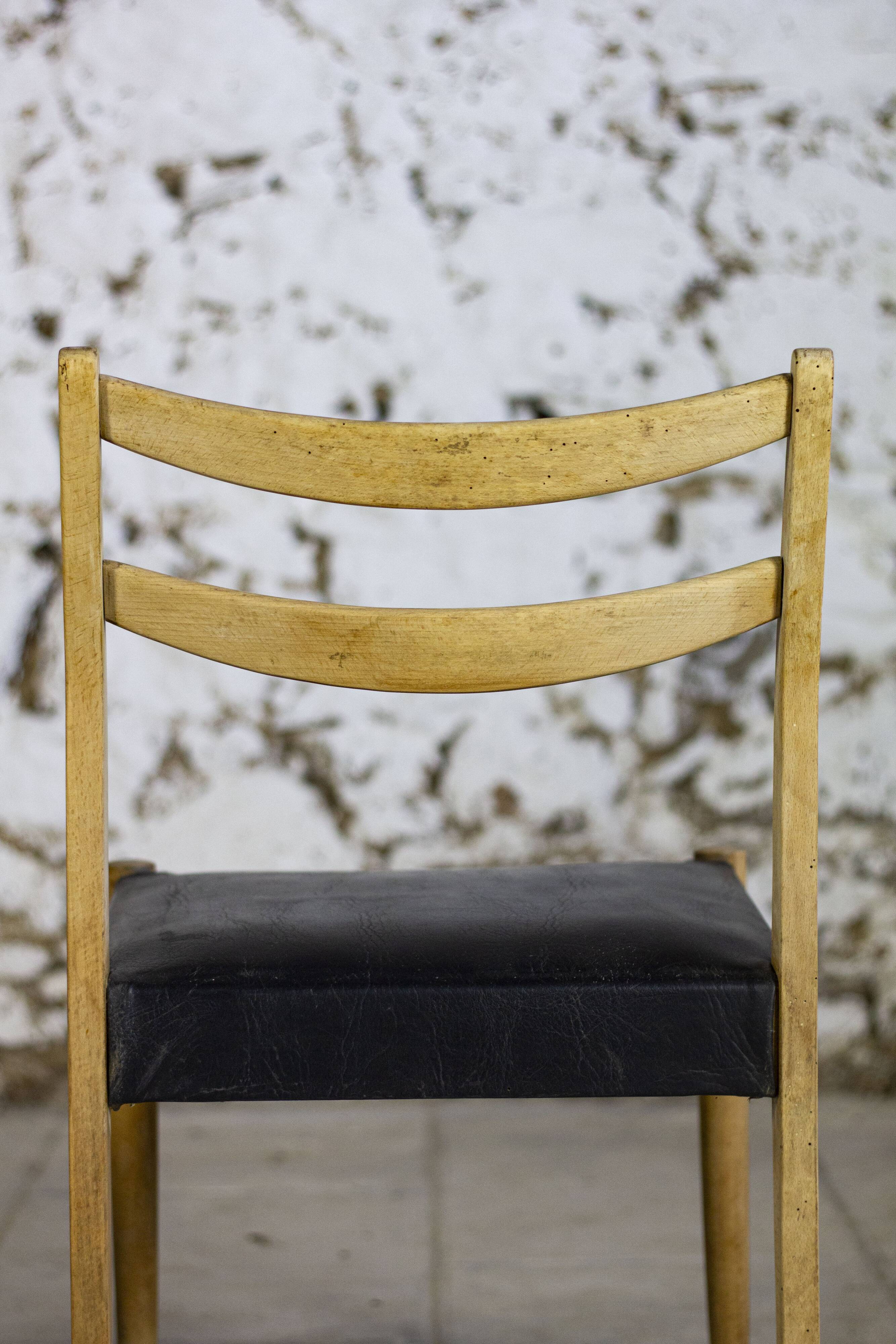 Scandinavian chair in teak and faux leather, 1960.