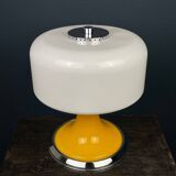 Mid-century Italian yellow table lamp from the 1970s.