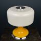 Mid-century Italian yellow table lamp from the 1970s.