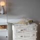 Small patinated art deco chest of drawers
