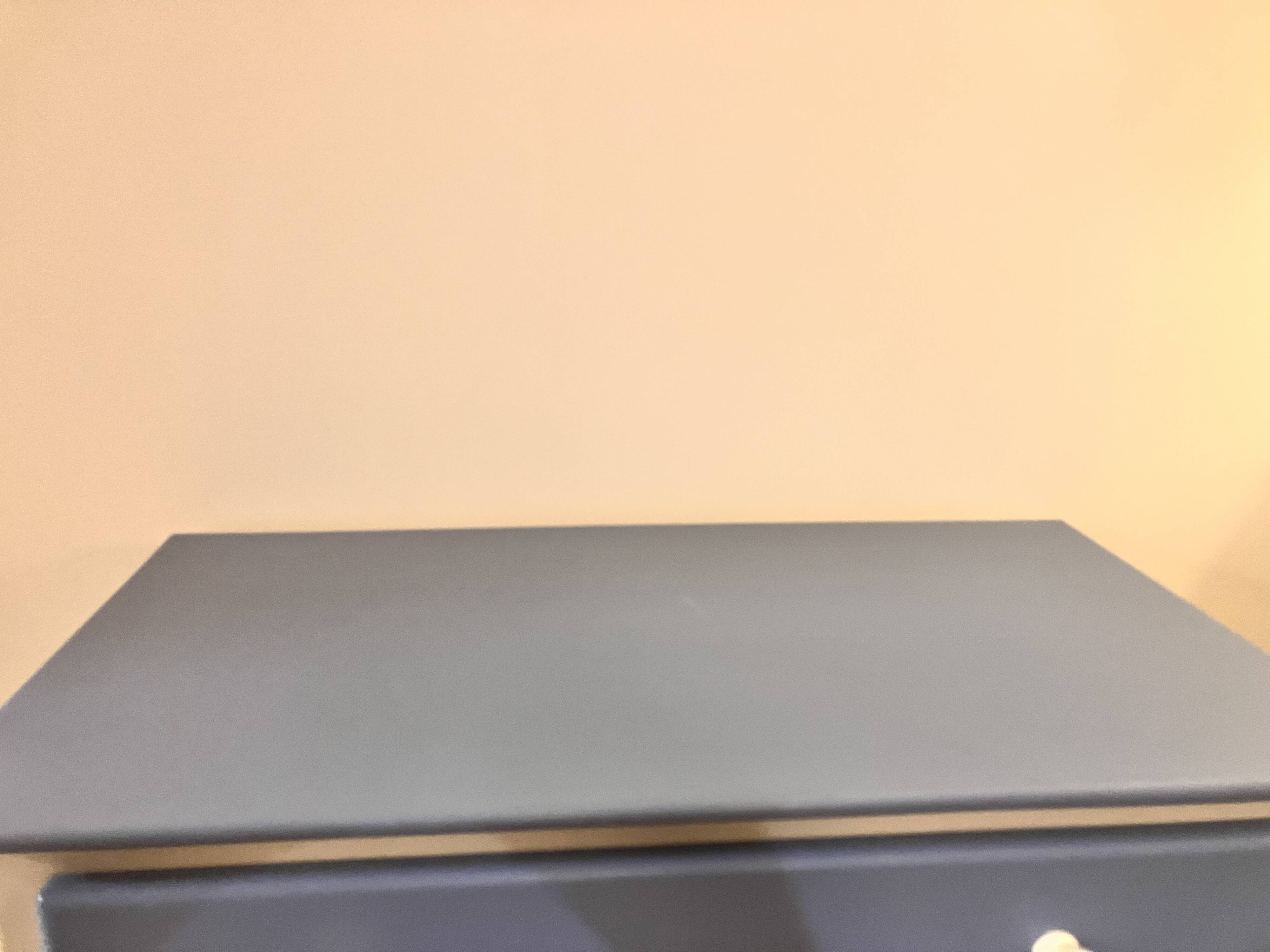 Wooden chest of drawers with tapered legs