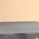 Wooden chest of drawers with tapered legs