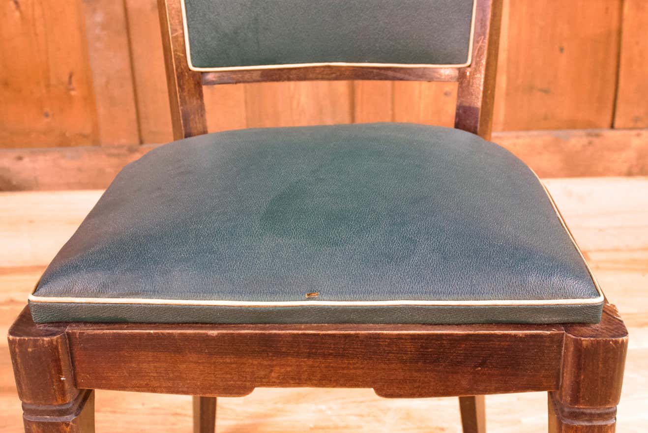 Art Deco set of four Jaguar green wooden and leatherette chairs, circa 1950