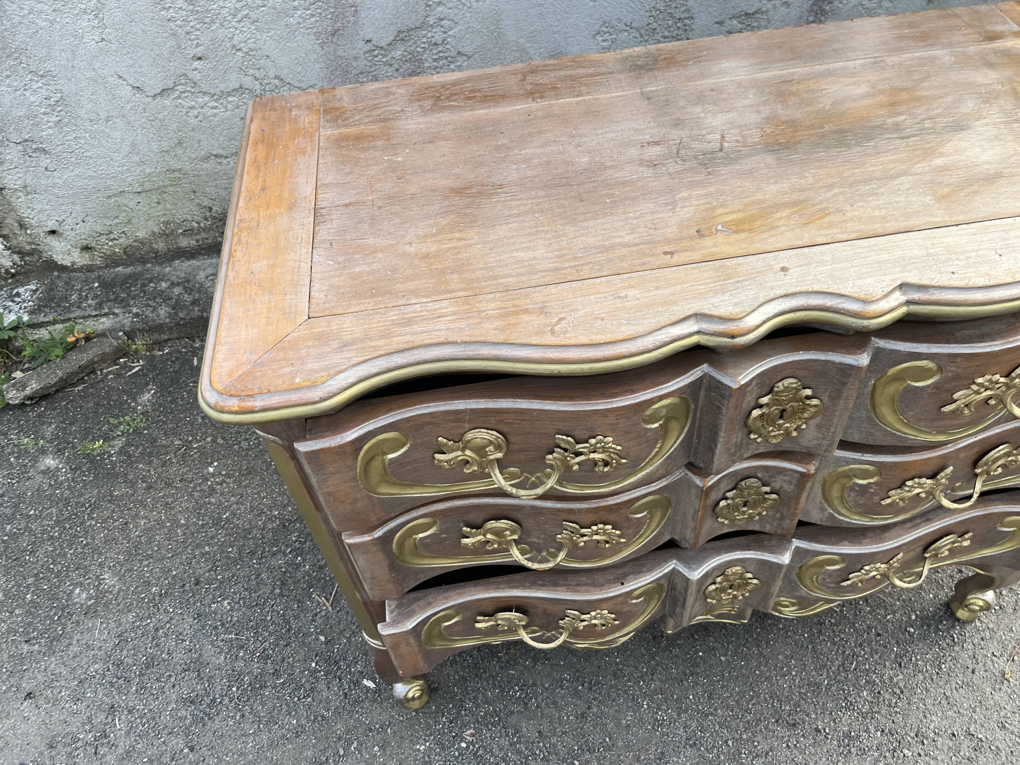 Antique crossbow commode in Louis XV style, walnut, with 3 drawers and gilded bronze fittings.