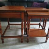 Nesting tables in solid cherry wood held together by slides