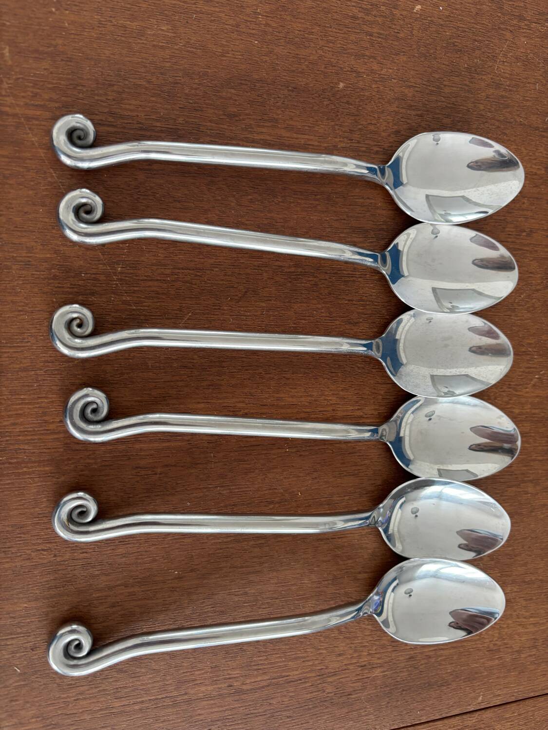 Vintage 24-piece stainless steel cutlery set with spiral handles