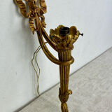 Bronze wall light, decorated with a bow and ribbon.