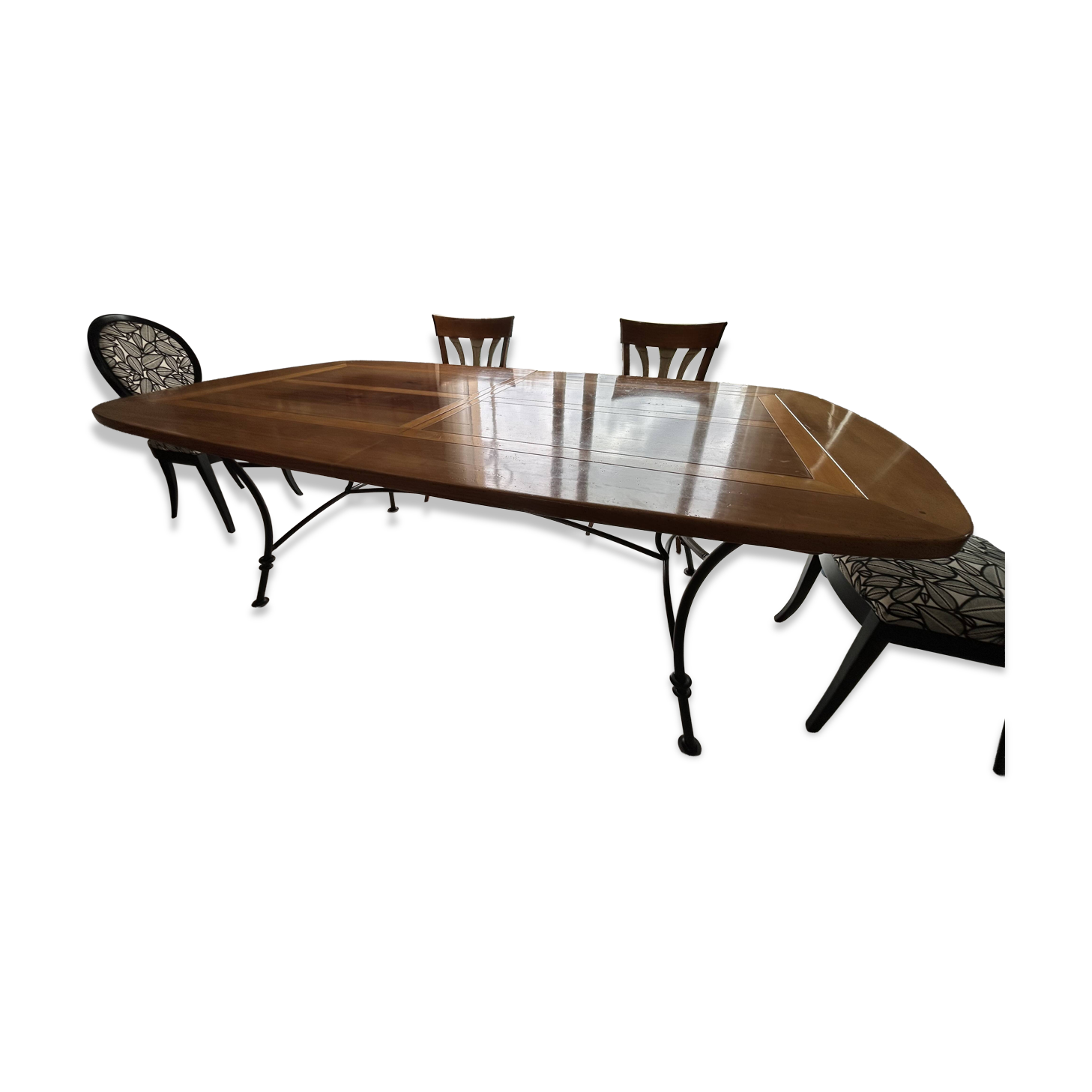 Extendable table in cherry wood with wrought iron legs.