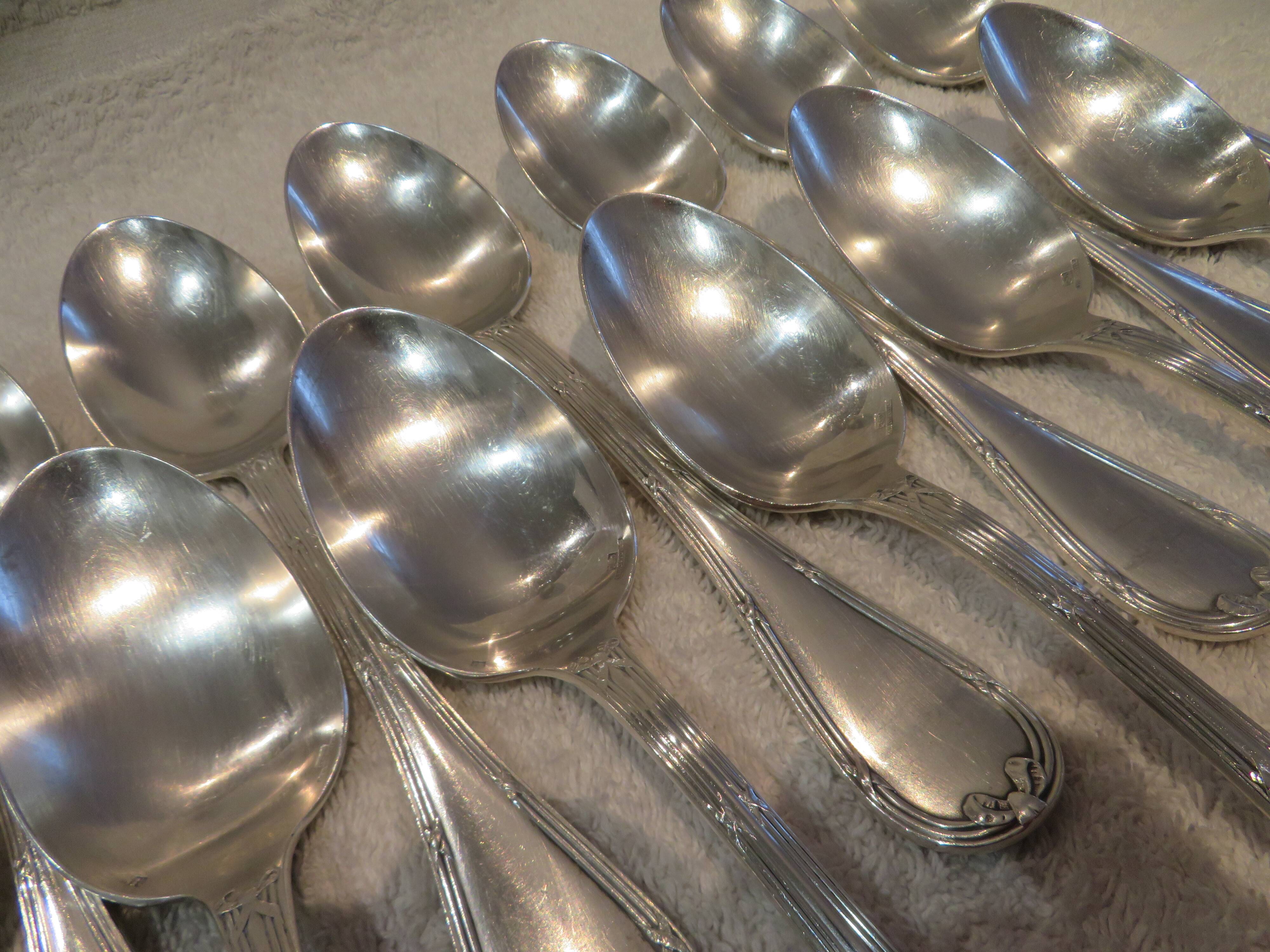 12 silver plated soup spoons by Christofle with Louis XVI ribbons