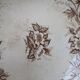 Flat serving compote dish in Terre de Fer HB & Cie with brown floral decoration.