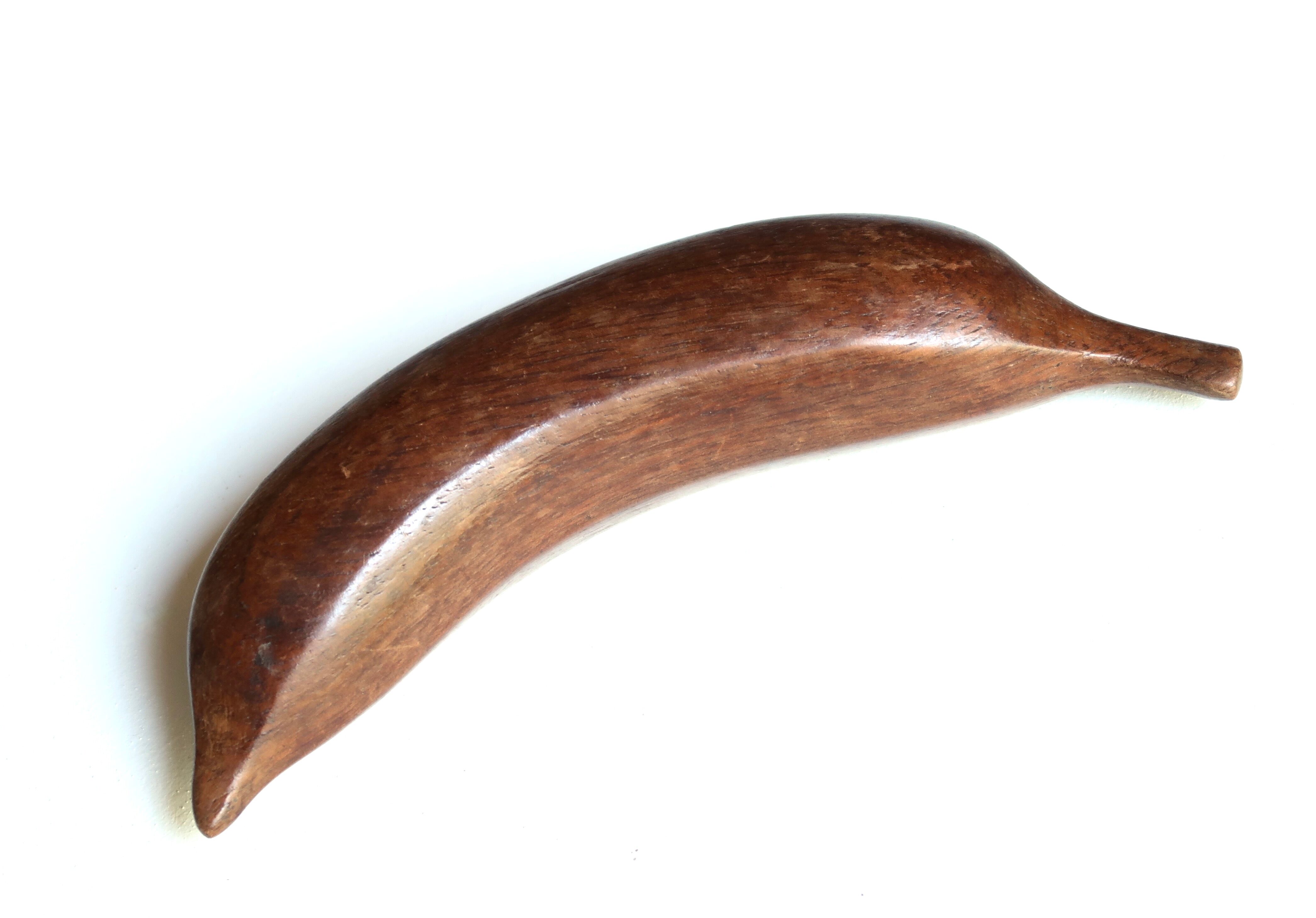 Wooden banana paperweight, 70s
