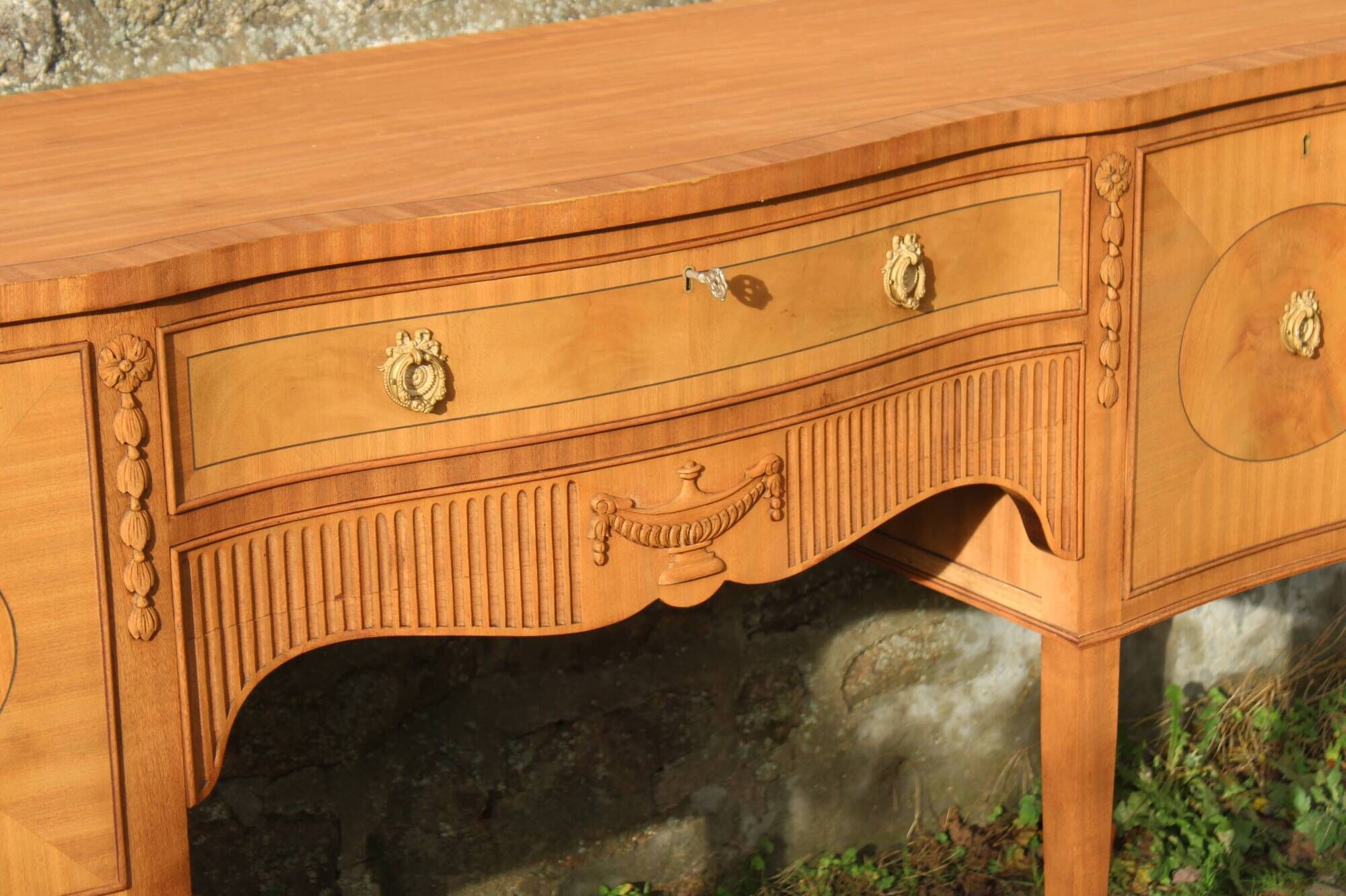 English-made enfilade in Louis XVI style with light wood veneers.