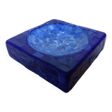 Blue mosaic pocket emptier