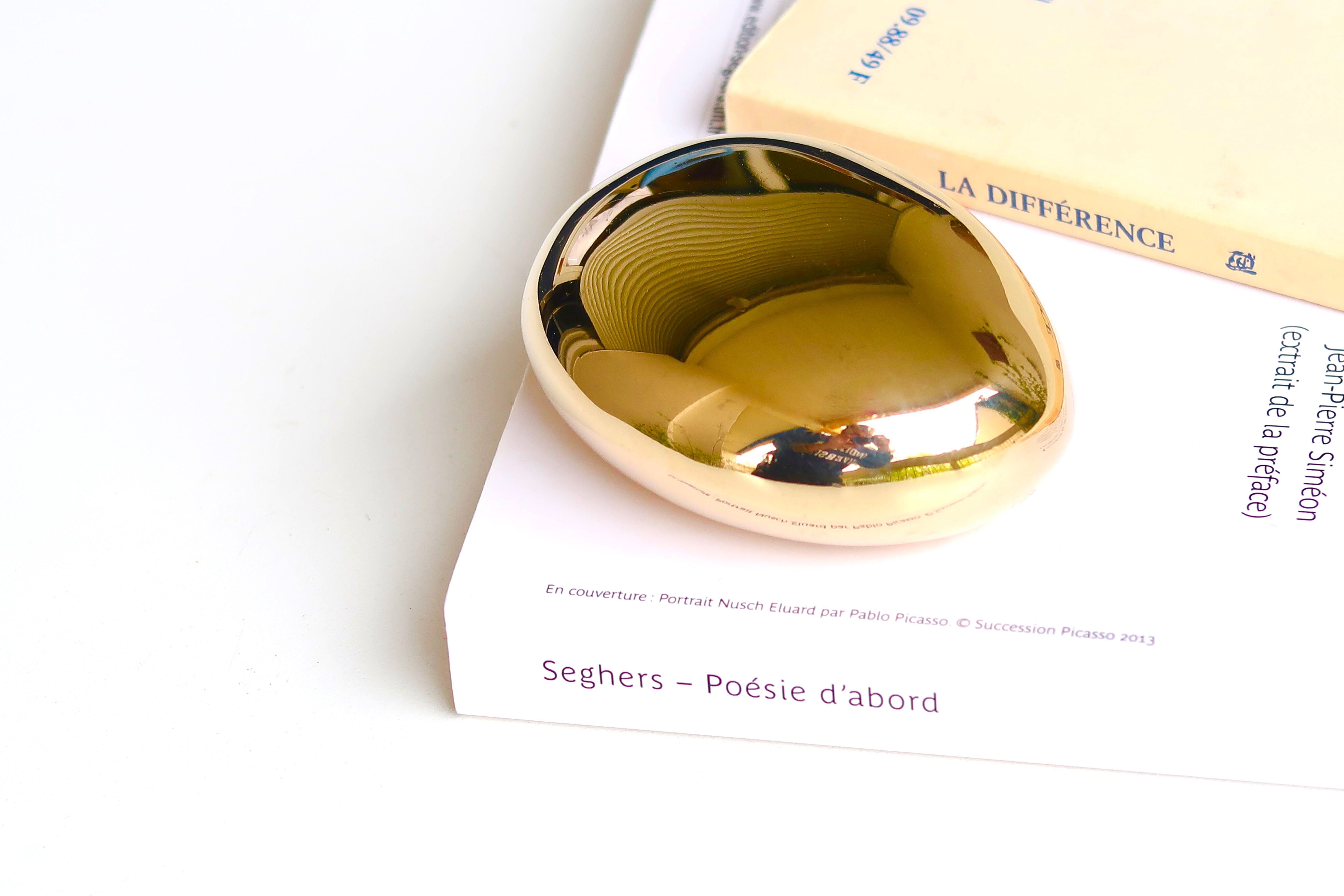 Bronze bottle opener by Monique Gerber 70s