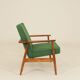 Scandinavian modern chair in green wool, vintage wooden armchair.