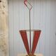 Perforated sheet metal umbrella stand and scoubidou