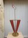 Perforated sheet metal umbrella stand and scoubidou