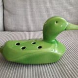 Vintage ceramic in the shape of a duck flowers