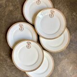 6 flat plates in gold porcelain monogrammed "F"