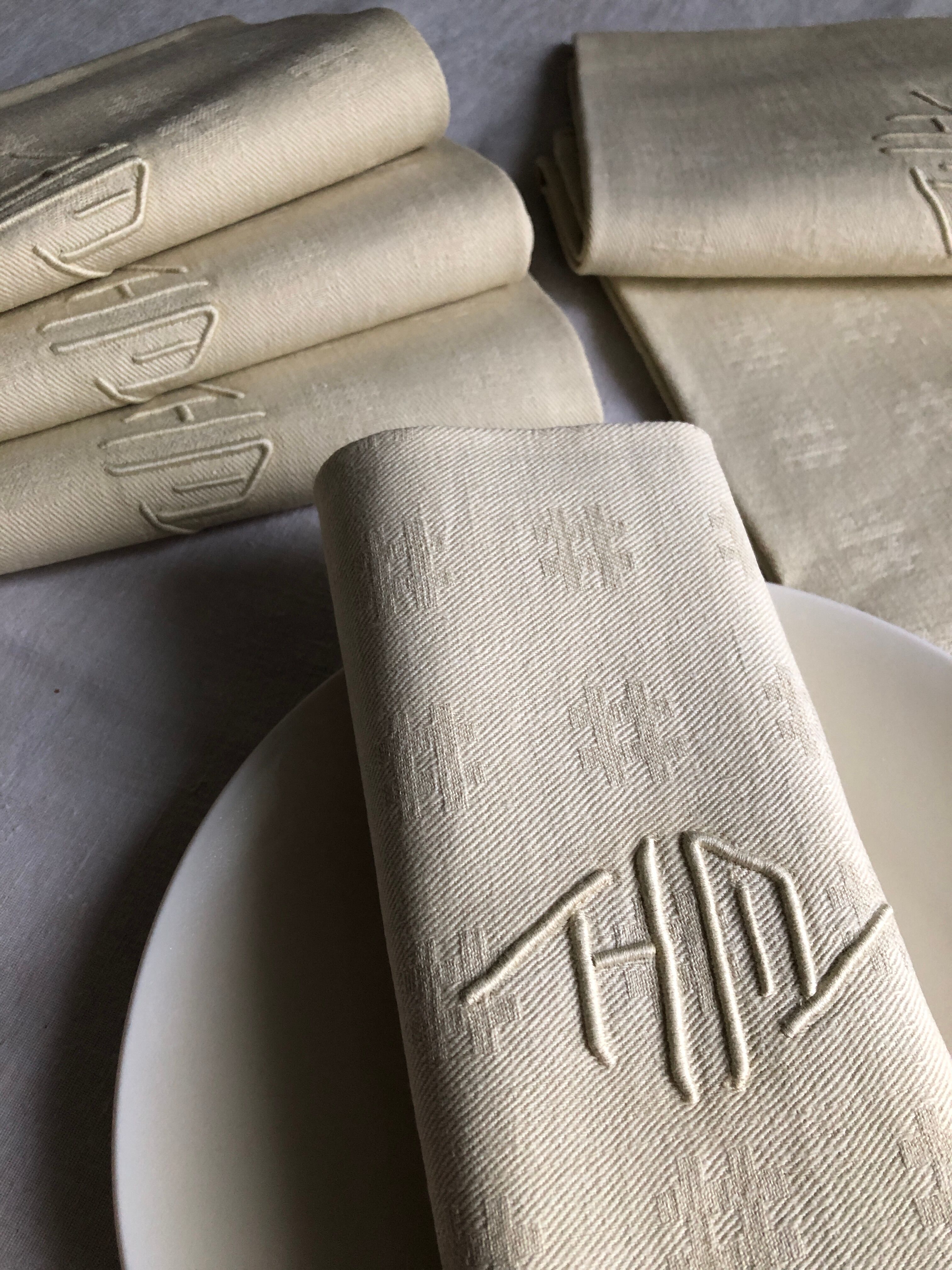 Antique napkins damascus and monogrammed tinted fresh butter
