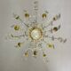 Lustre cage en bronze doré garni de pampilles en verre en forme de plumes de paon vers 1800